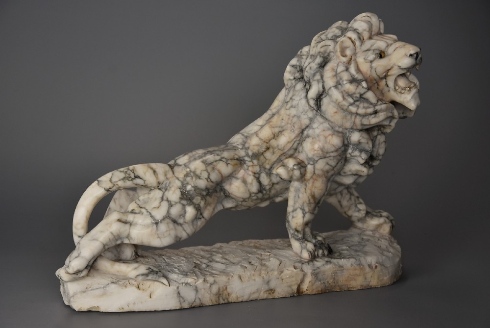 Highly decorative French Art Deco carved marble sculpture of a roaring male lion View V