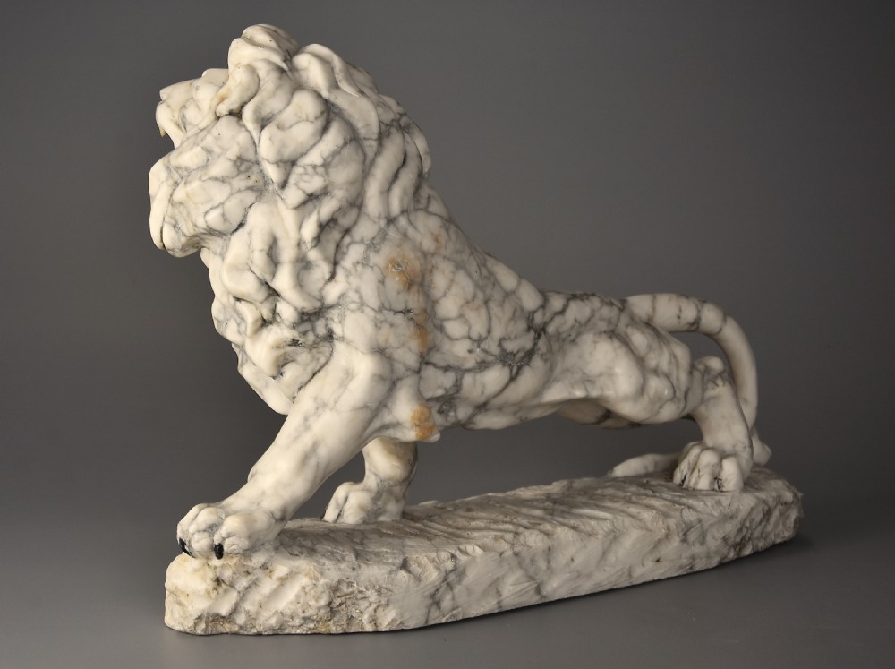 Highly decorative French Art Deco carved marble sculpture of a roaring male lion View VI