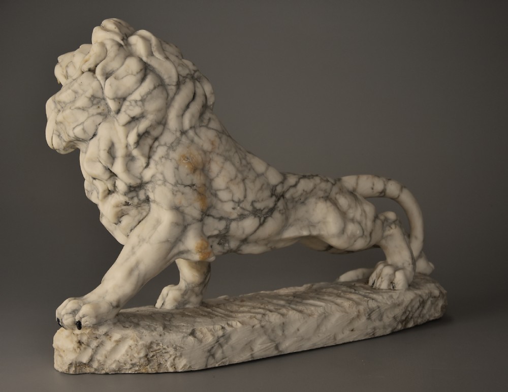 Highly decorative French Art Deco carved marble sculpture of a roaring male lion View VII