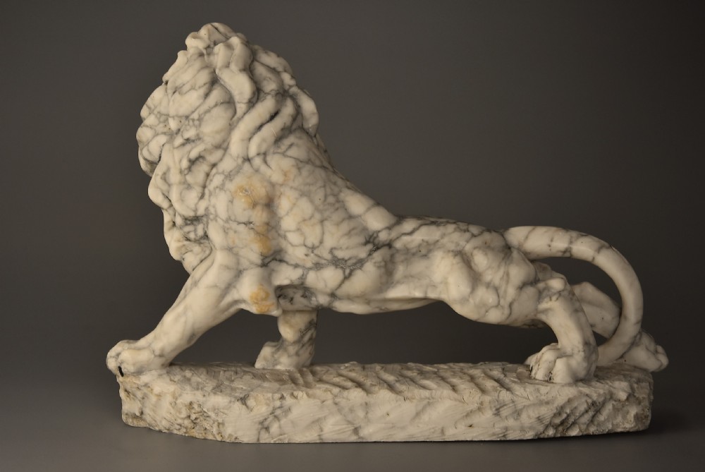 Highly decorative French Art Deco carved marble sculpture of a roaring male lion View VIII