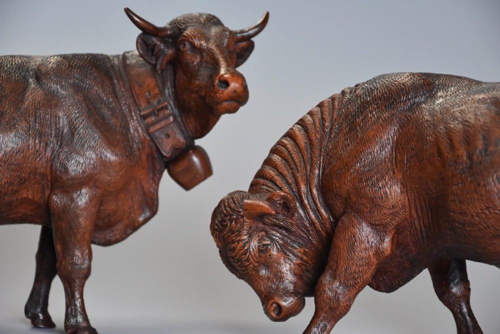 Pair of finely carved late 19th century linden wood Black Forest cows, possibly by The Huggler family View III