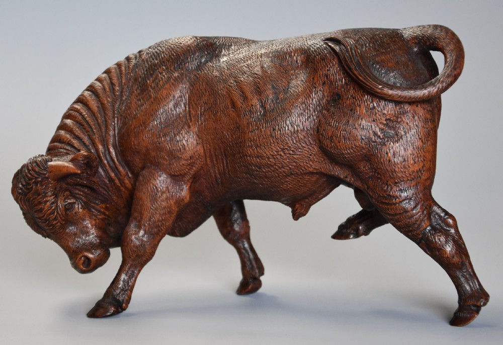 Pair of finely carved late 19th century linden wood Black Forest cows, possibly by The Huggler family View IX