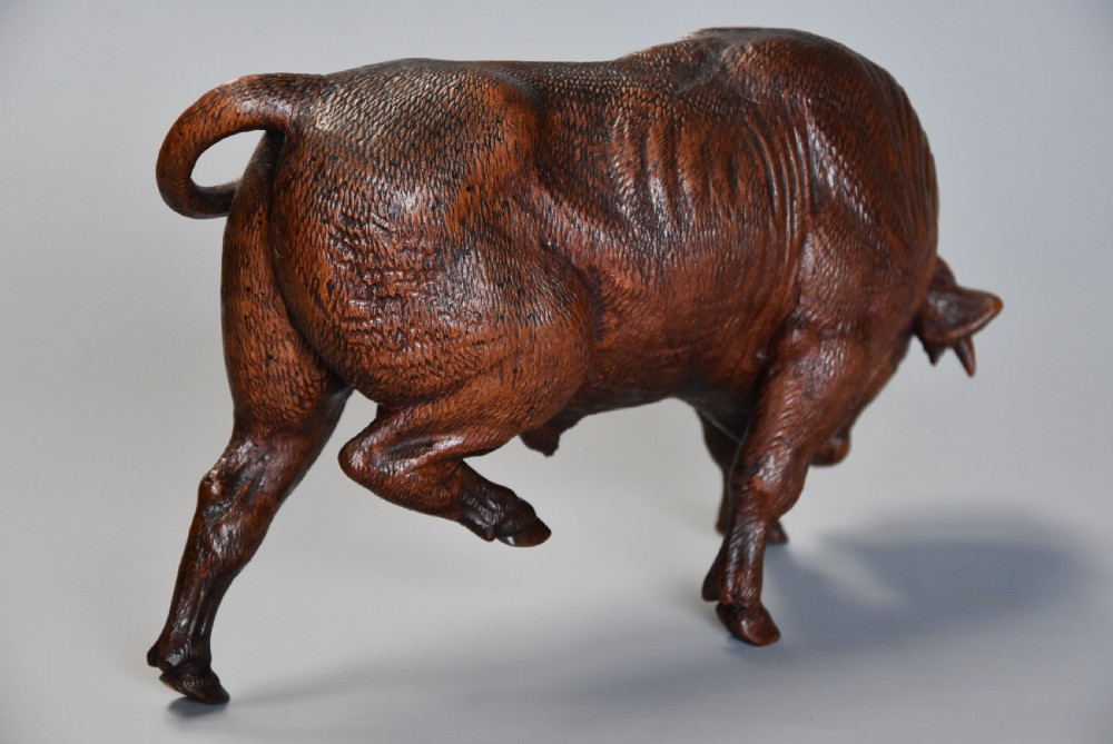 Pair of finely carved late 19th century linden wood Black Forest cows, possibly by The Huggler family View XII