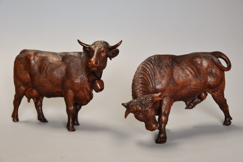 Pair of finely carved late 19th century linden wood Black Forest cows, possibly by The Huggler family View XIV