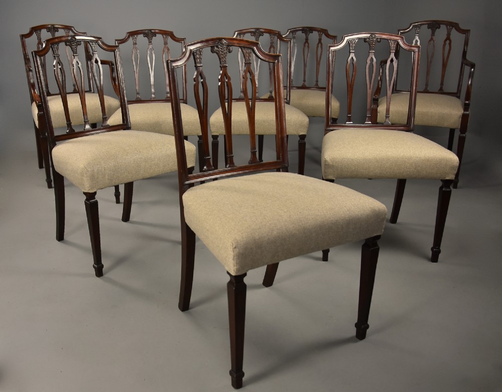 An elegant set of eight late 18th century Sheraton mahogany dining chairs of fine original patina