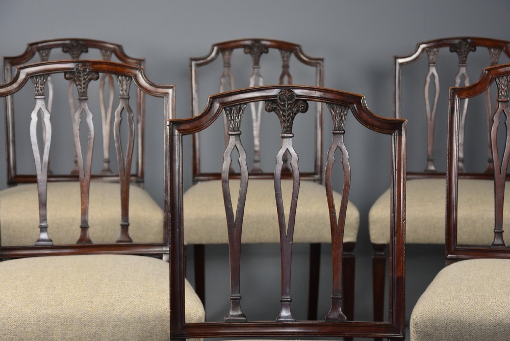 An elegant set of eight late 18th century Sheraton mahogany dining chairs of fine original patina View V