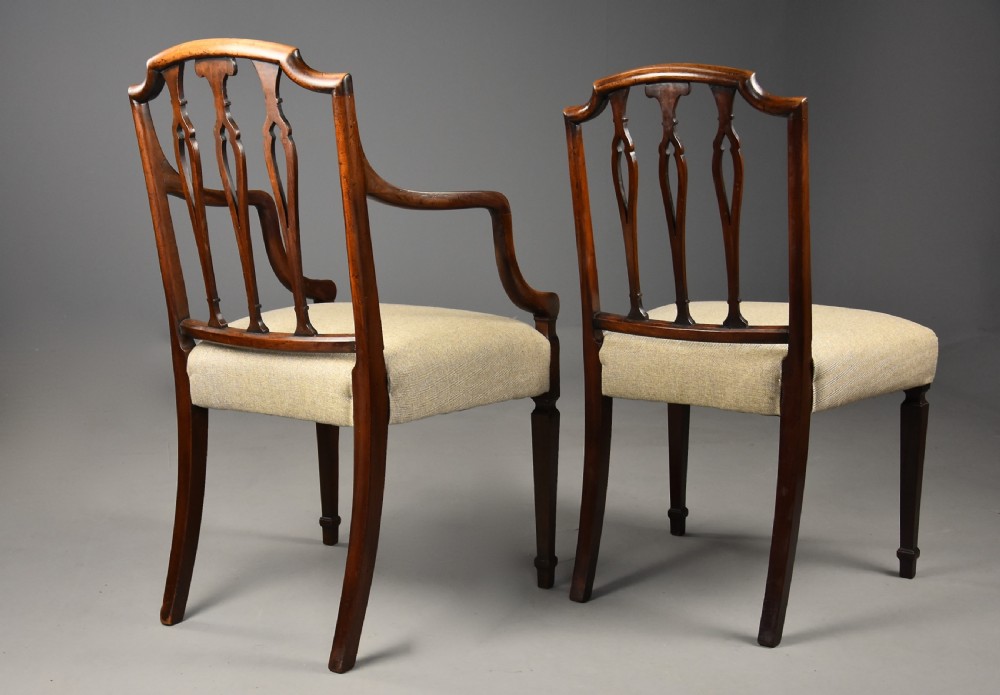 An elegant set of eight late 18th century Sheraton mahogany dining chairs of fine original patina View X
