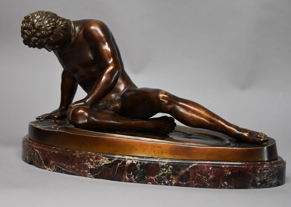 Late 19th century large Grand Tour bronze figure of 'The Dying Gaul' on marble base, after the antique View II