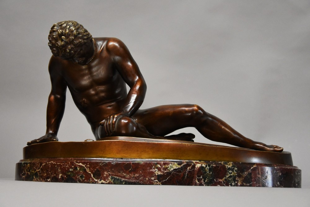 Late 19th century large Grand Tour bronze figure of 'The Dying Gaul' on marble base, after the antique View IV