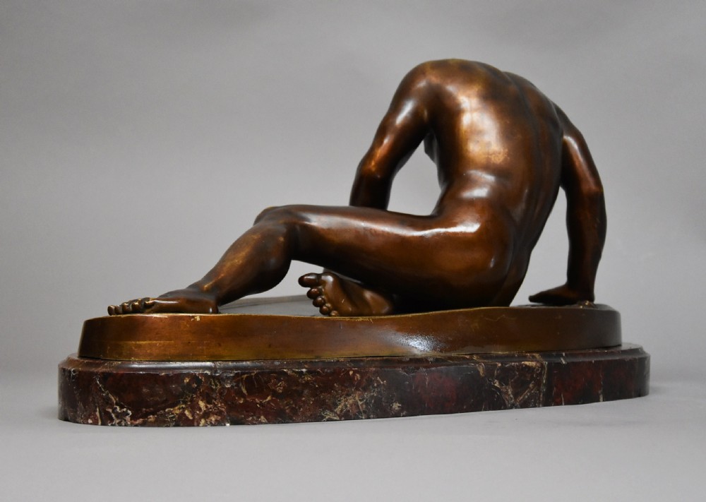 Late 19th century large Grand Tour bronze figure of 'The Dying Gaul' on marble base, after the antique View VII