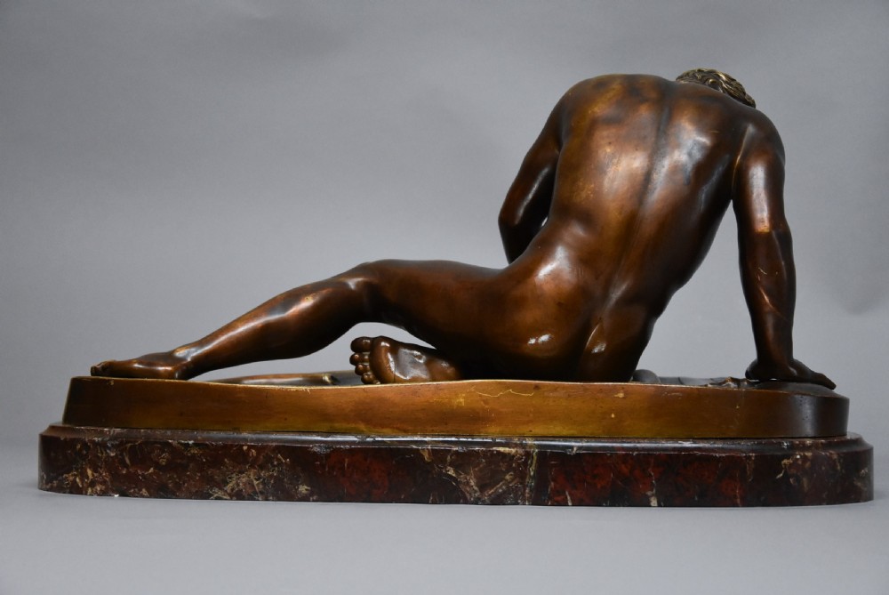 Late 19th century large Grand Tour bronze figure of 'The Dying Gaul' on marble base, after the antique View XI