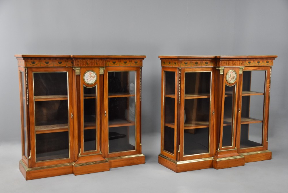 Superb pair of late 19thc Exhibition quality satinwood breakfront display cabinets View III