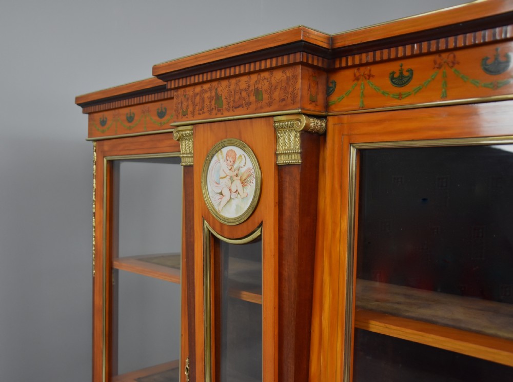Superb pair of late 19thc Exhibition quality satinwood breakfront display cabinets View X