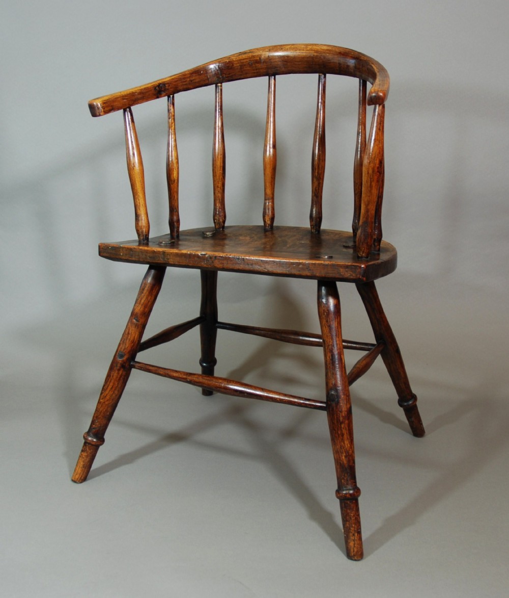 Charming early 19th century primitive hoop back ash Windsor child's chair of superb patina