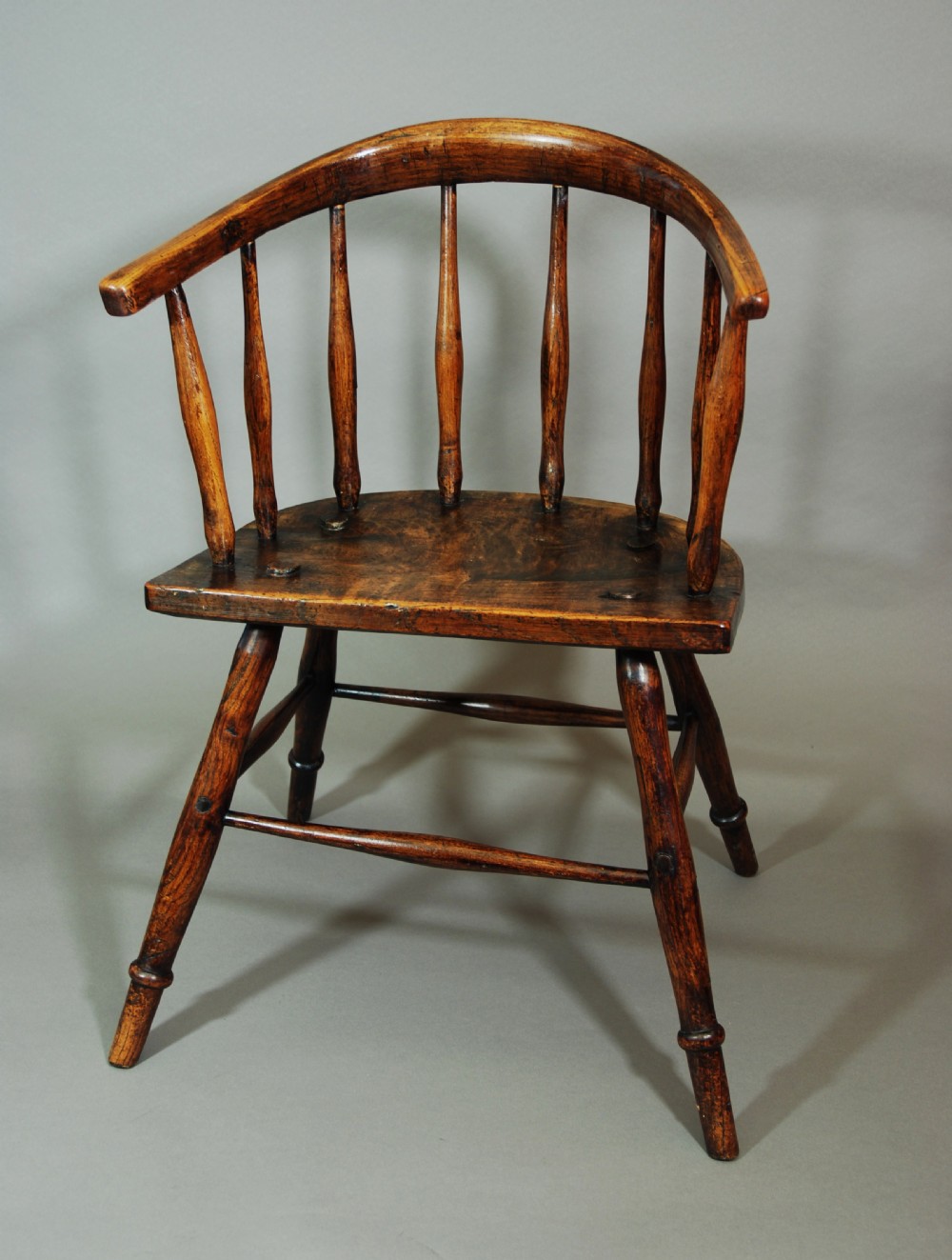 Charming early 19th century primitive hoop back ash Windsor child's chair of superb patina View II