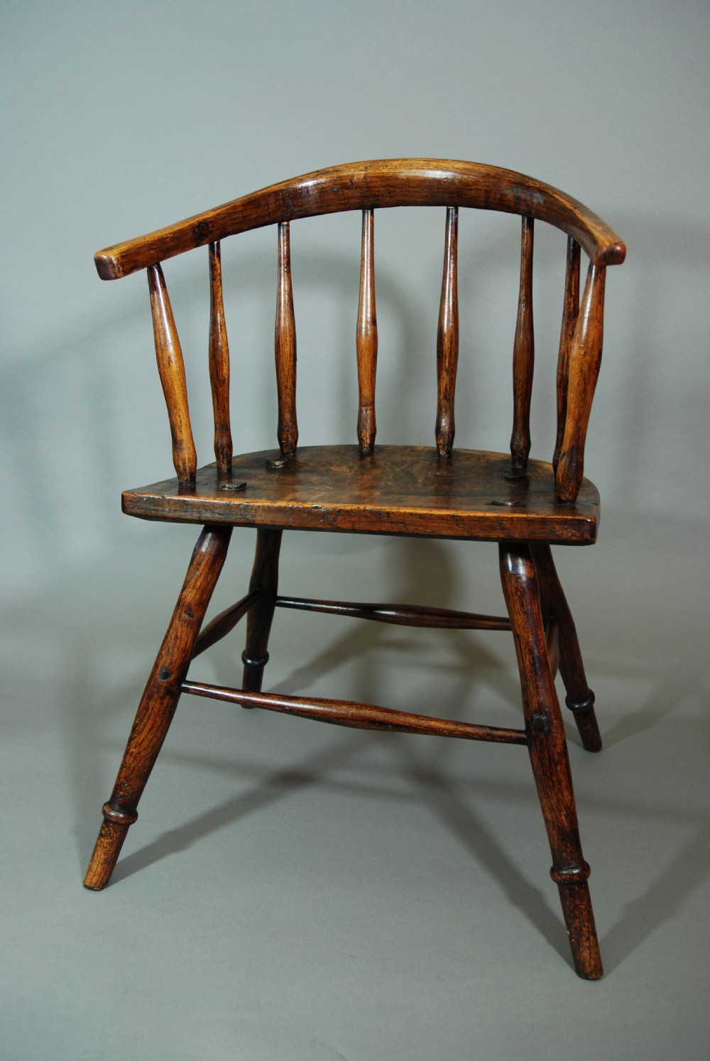 Charming early 19th century primitive hoop back ash Windsor child's chair of superb patina View III