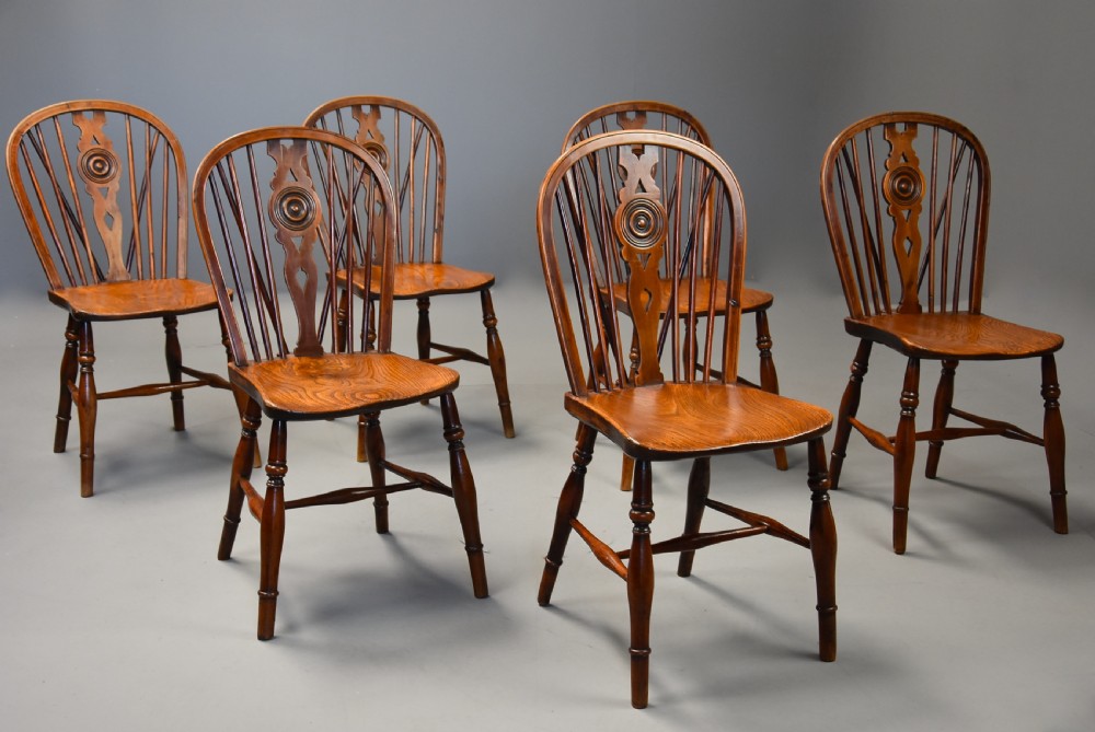 Rare set of six mid 19th century yew wood low back Windsor chairs of superb patina View II