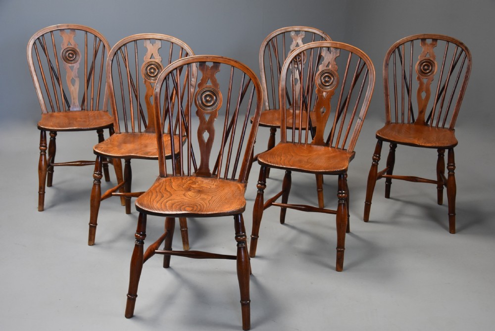 Rare set of six mid 19th century yew wood low back Windsor chairs of superb patina View III