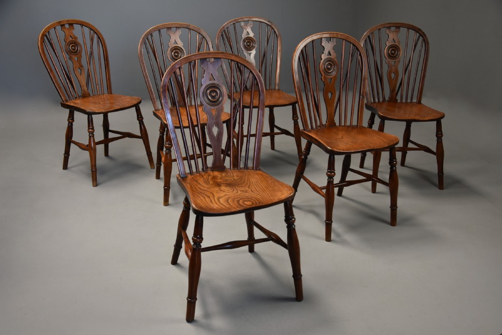Rare set of six mid 19th century yew wood low back Windsor chairs of superb patina View IV