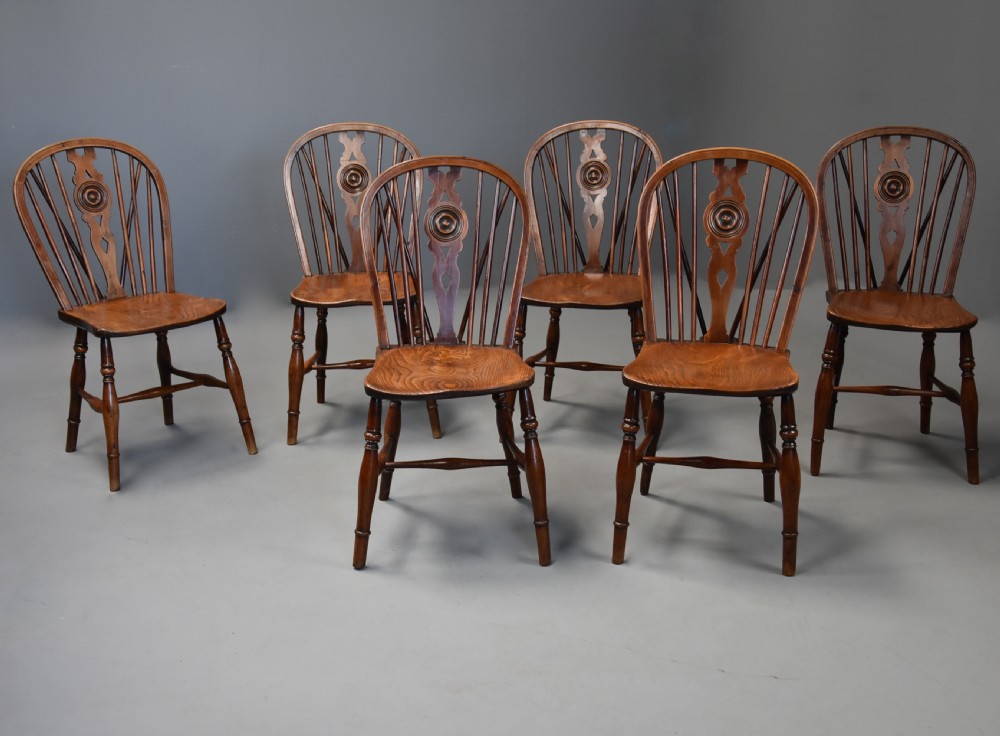 Rare set of six mid 19th century yew wood low back Windsor chairs of superb patina View V