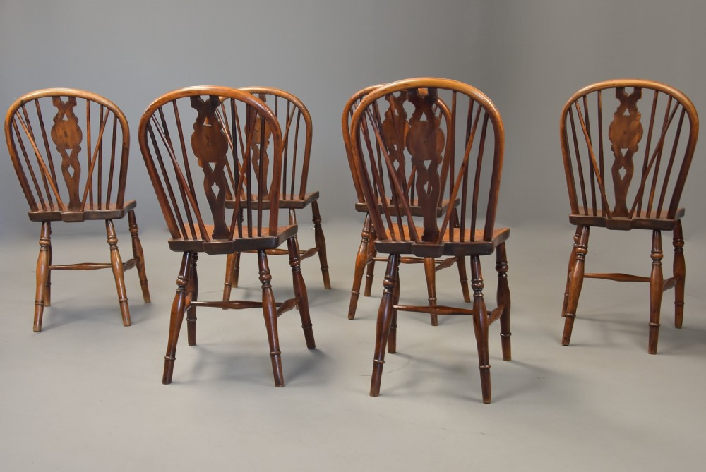 Rare set of six mid 19th century yew wood low back Windsor chairs of superb patina View XII