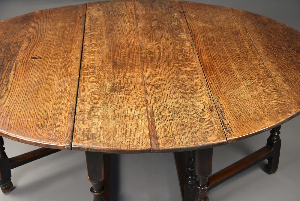 Large early 18th century oak gateleg table of exceptional patina View IV