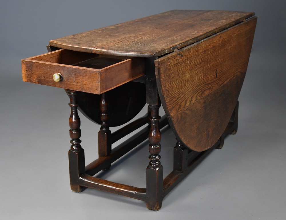 Large early 18th century oak gateleg table of exceptional patina View X