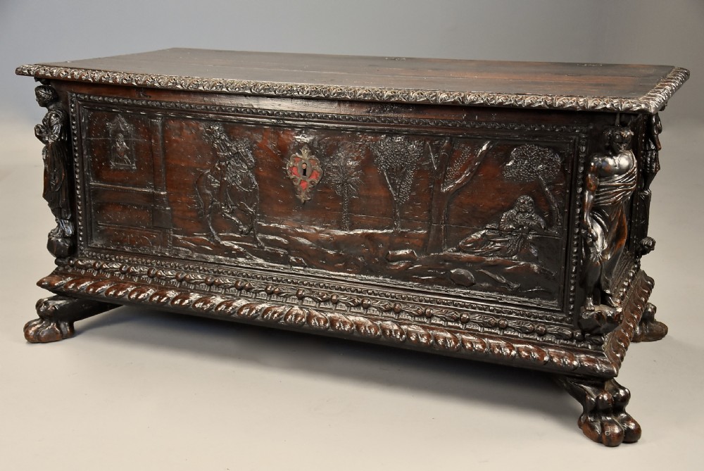 Elaborate mid 17th century Italian carved cedar and walnut cassone View II