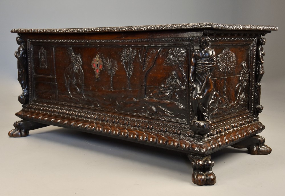 Elaborate mid 17th century Italian carved cedar and walnut cassone View III