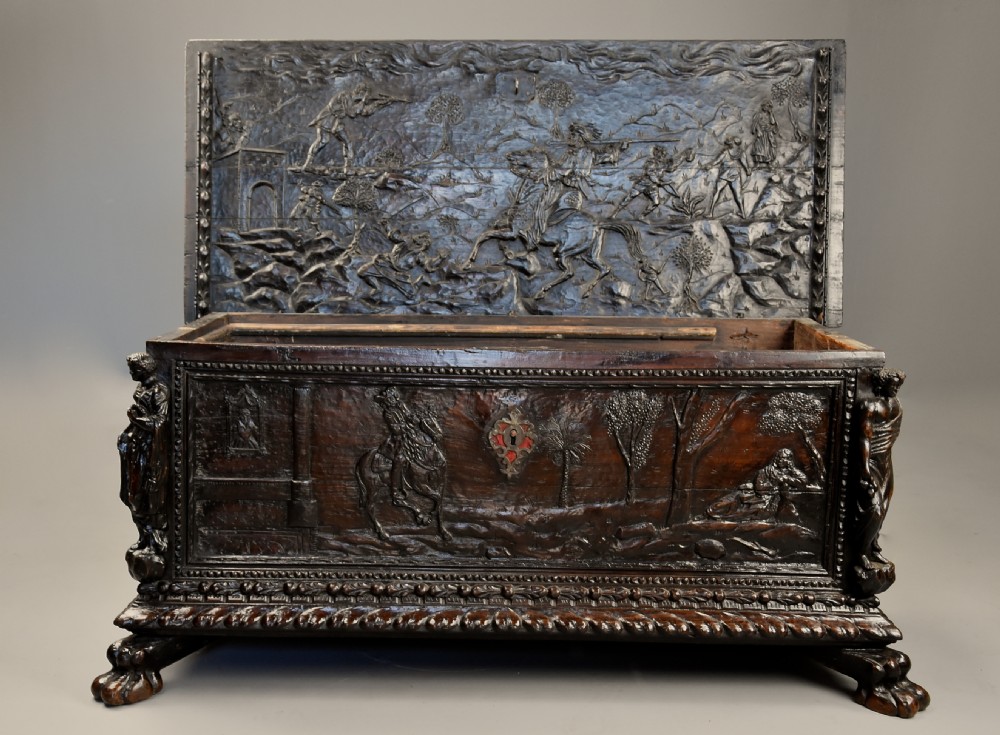 Elaborate mid 17th century Italian carved cedar and walnut cassone View IV