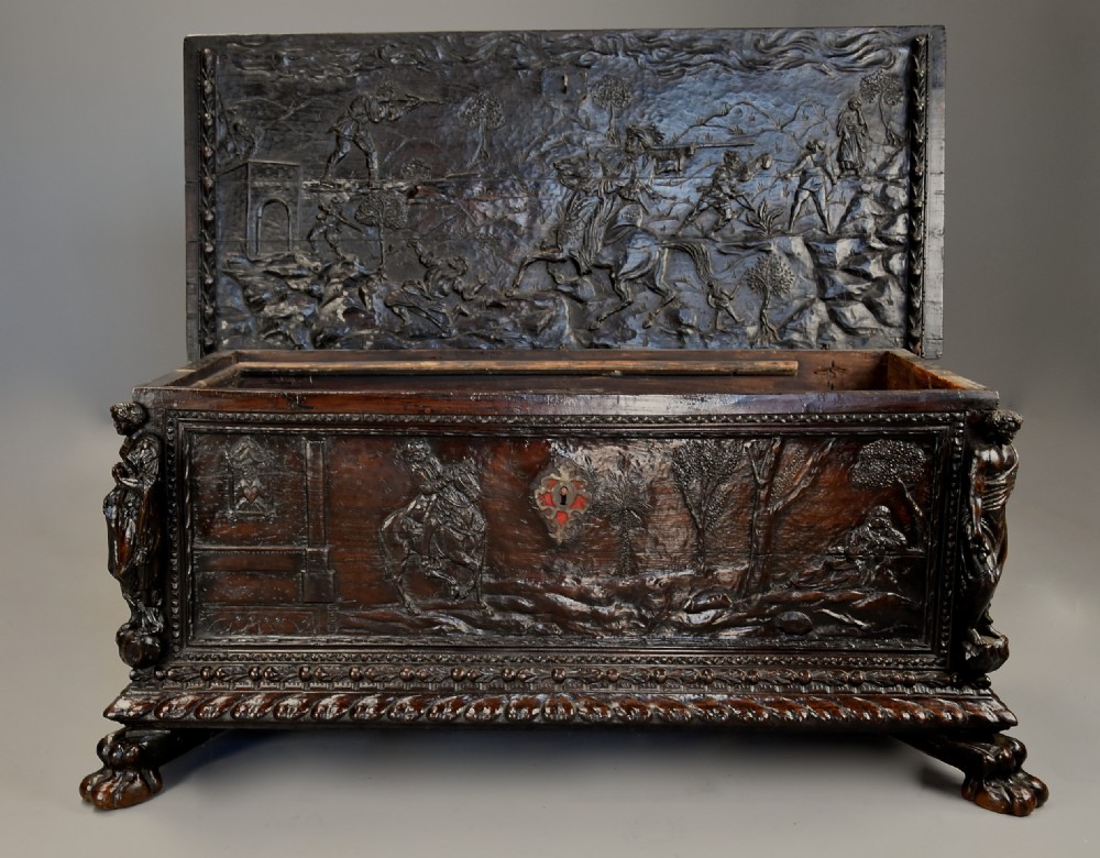 Elaborate mid 17th century Italian carved cedar and walnut cassone View VI