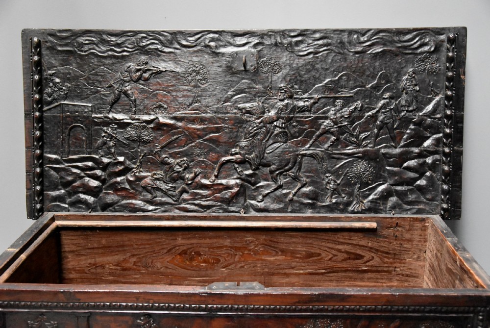 Elaborate mid 17th century Italian carved cedar and walnut cassone View VII