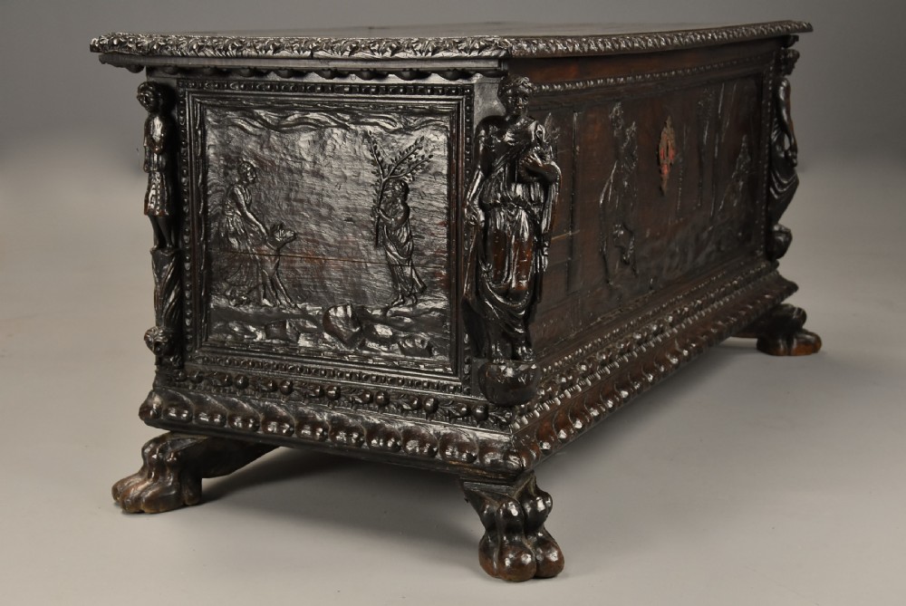 Elaborate mid 17th century Italian carved cedar and walnut cassone View XI