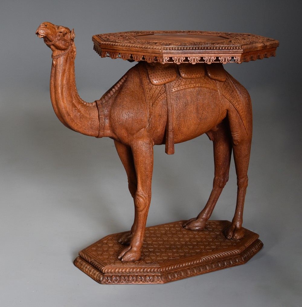 Superb quality late 19thc Anglo Indian hardwood camel table of good patina