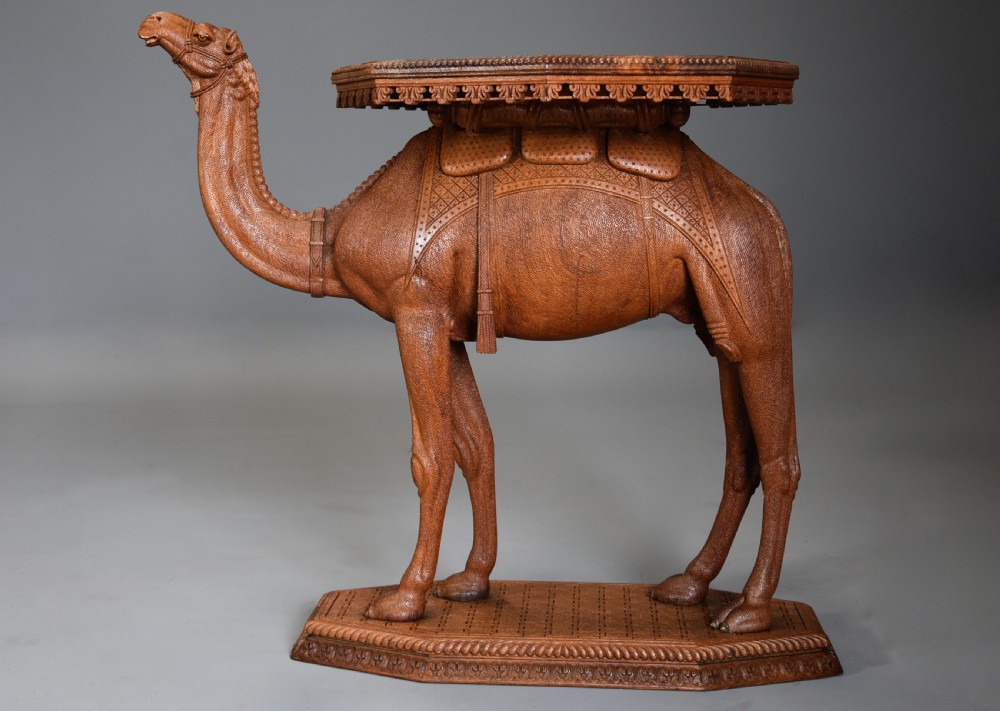 Superb quality late 19thc Anglo Indian hardwood camel table of good patina View II