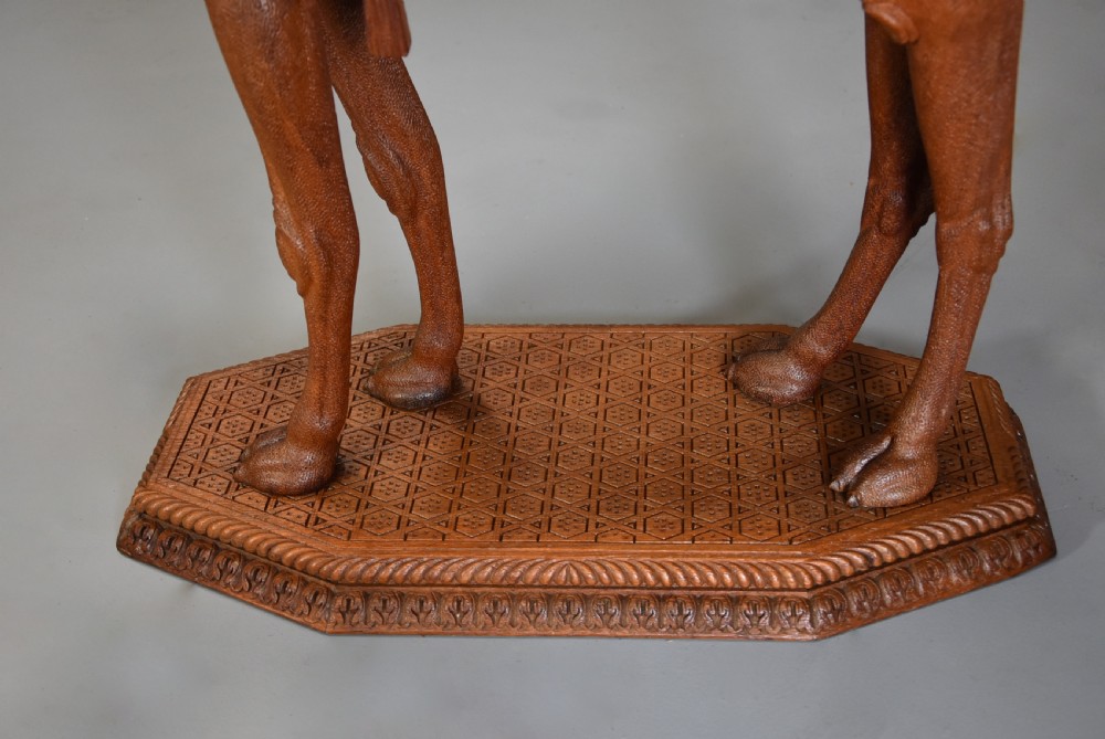 Superb quality late 19thc Anglo Indian hardwood camel table of good patina View XIII