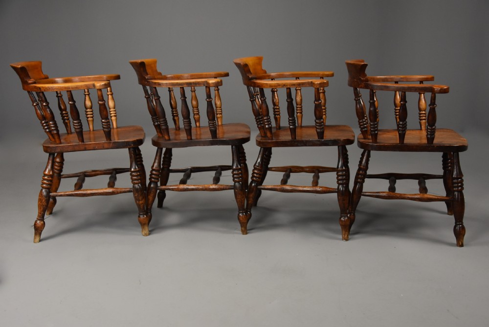 Set of four mid 19th century  ash, elm & beech smokers bow Windsor or Captain’s chairs View IV
