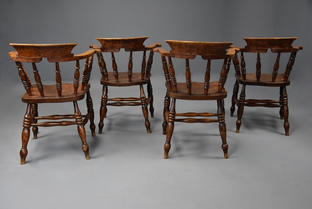 Set of four mid 19th century  ash, elm & beech smokers bow Windsor or Captain’s chairs View XIV