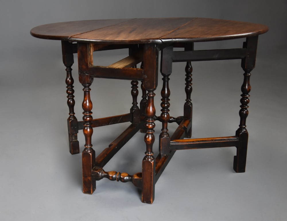 Rare late 17th century walnut gateleg table of superb patina View XV