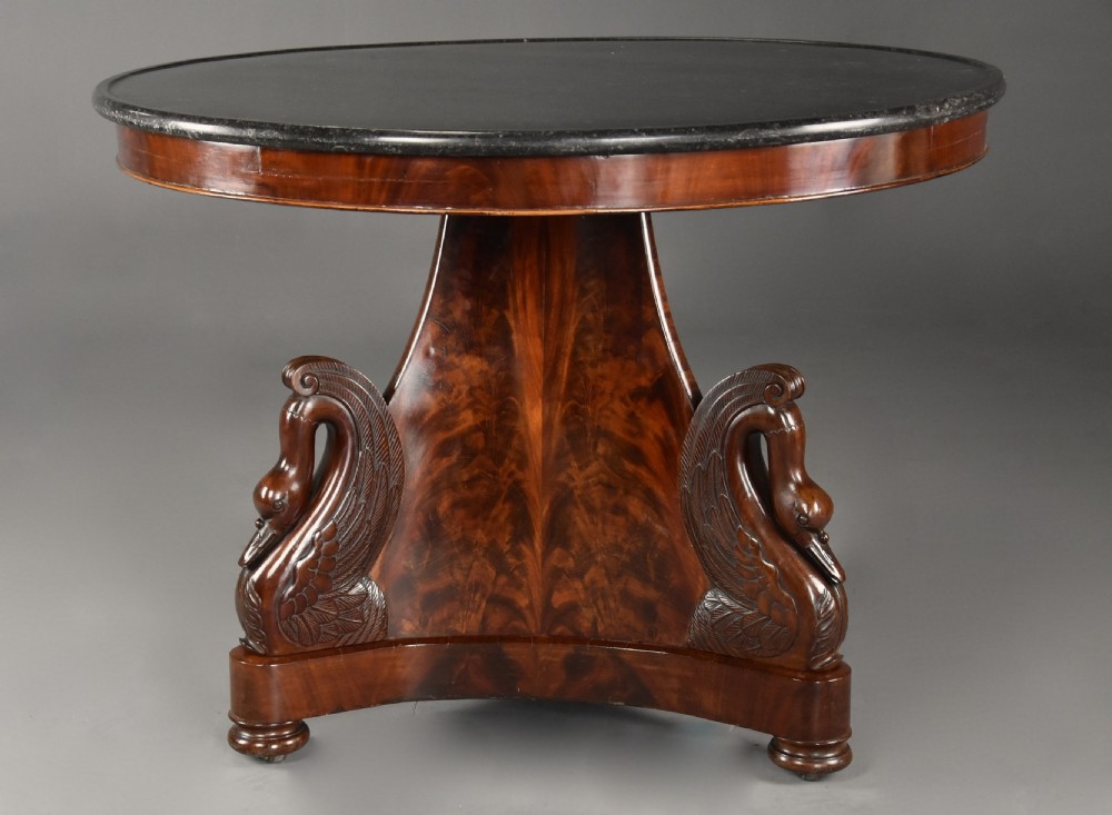 Fine quality near pair of 19thc French Empire mahogany gueridon tables with carved swan decoration  View IV