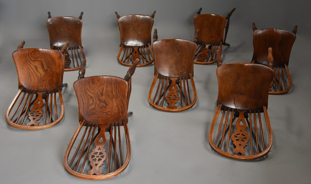 Harlequin set of eight mid 19th century ash and elm wheelback Windsor chairs of superb patina View XVI