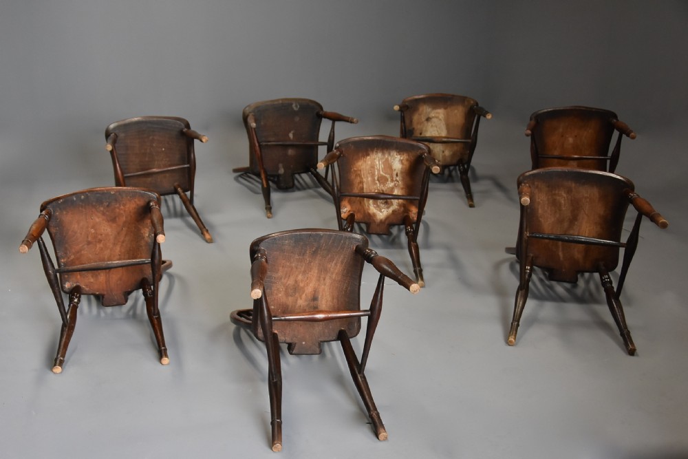 Harlequin set of eight mid 19th century ash and elm wheelback Windsor chairs of superb patina View XVII