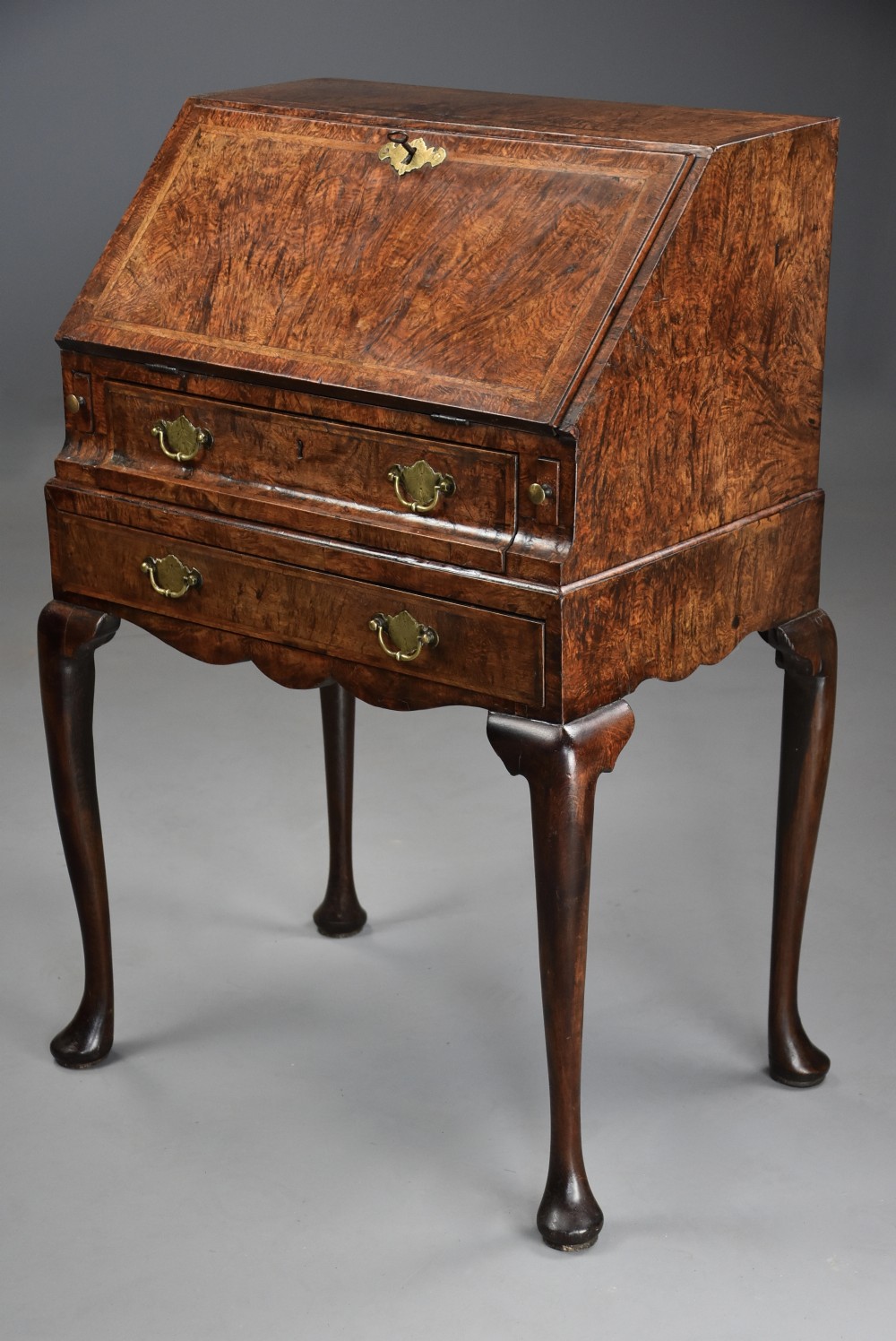 Extremely rare George I pollard oak bureau on stand of superb patina and small proportions