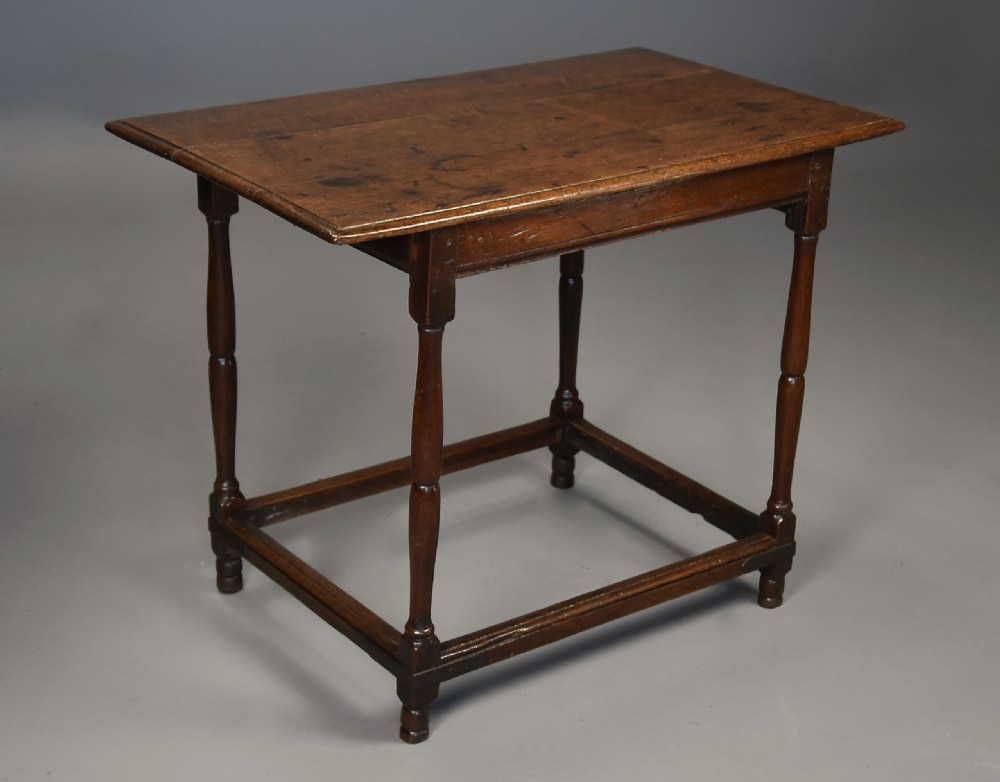 Early 18th century unusual oak tavern table of fine patina