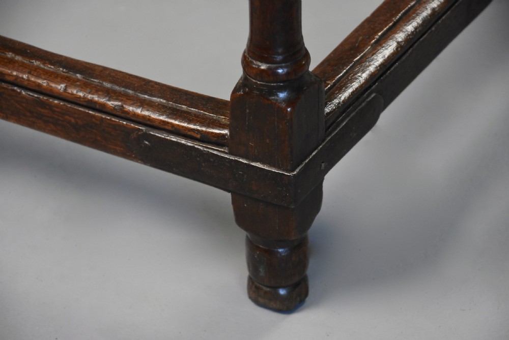 Early 18th century unusual oak tavern table of fine patina View IX