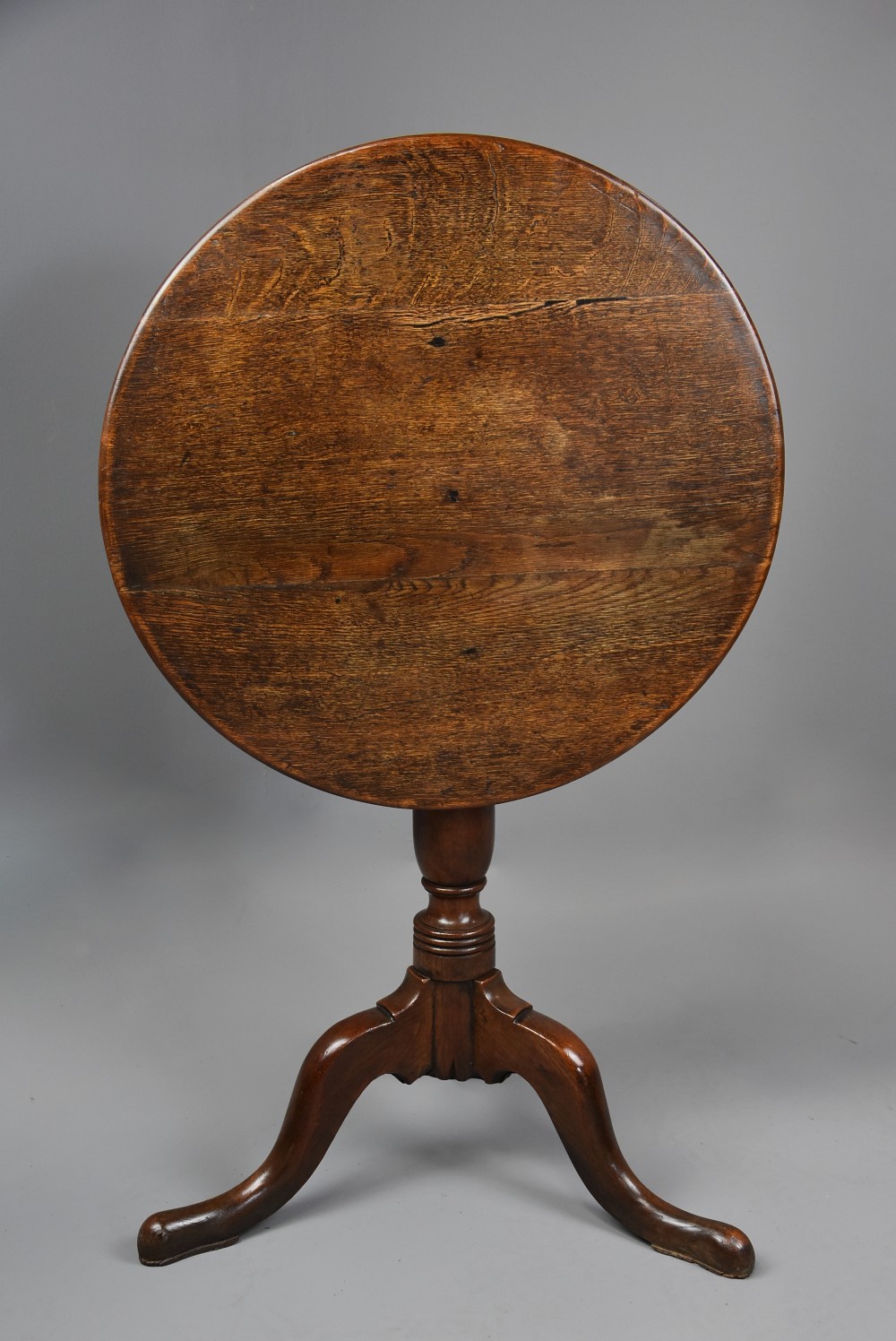 Mid 18th century oak tilt top tripod table of fine patina