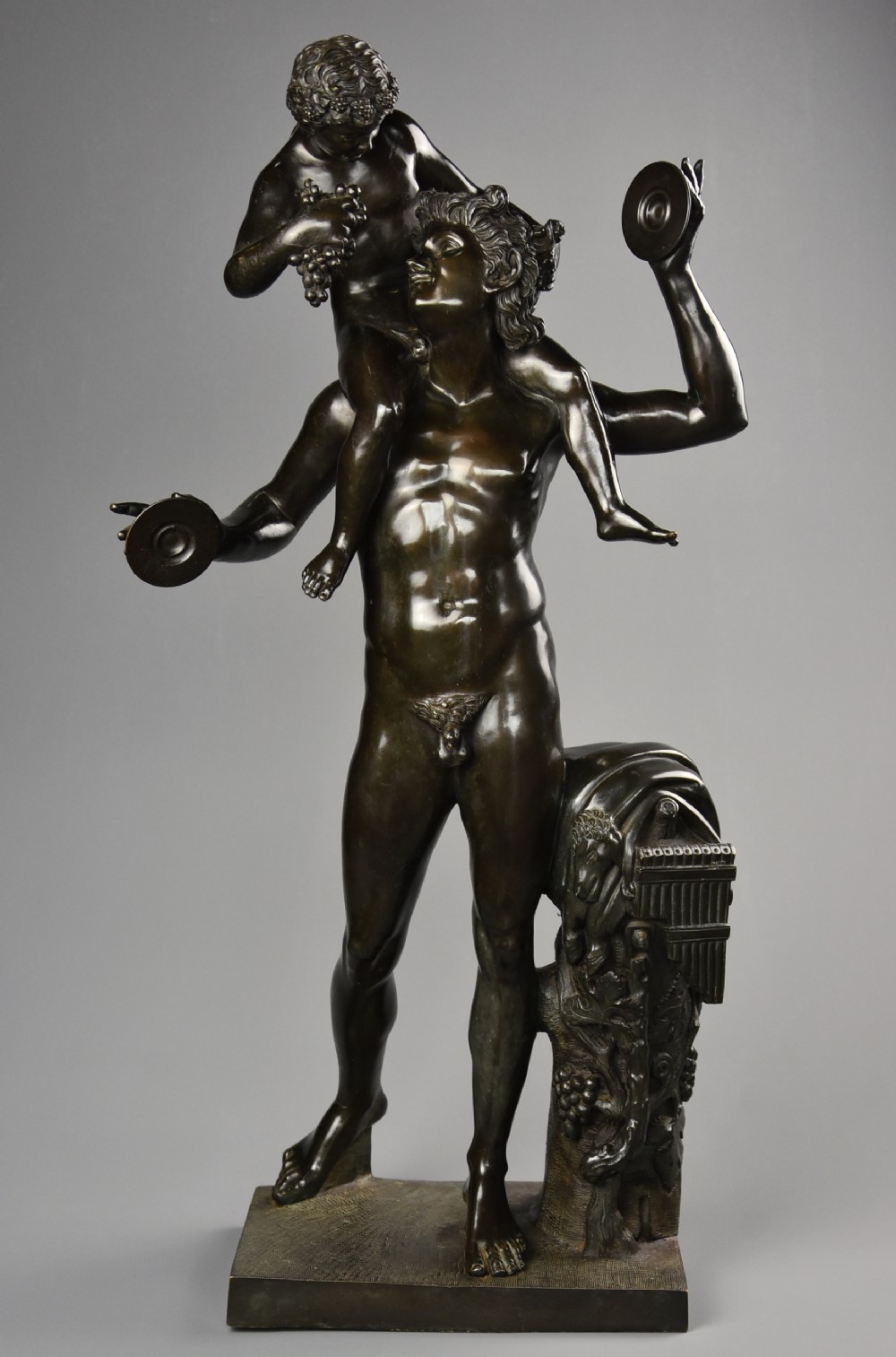 Large fine quality late 19th century Grand Tour Italian bronze group of a ‘Dancing faun with the infant Bacchus’