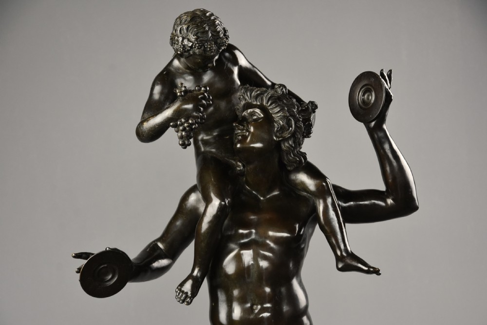 Large fine quality late 19th century Grand Tour Italian bronze group of a ‘Dancing faun with the infant Bacchus’ View II