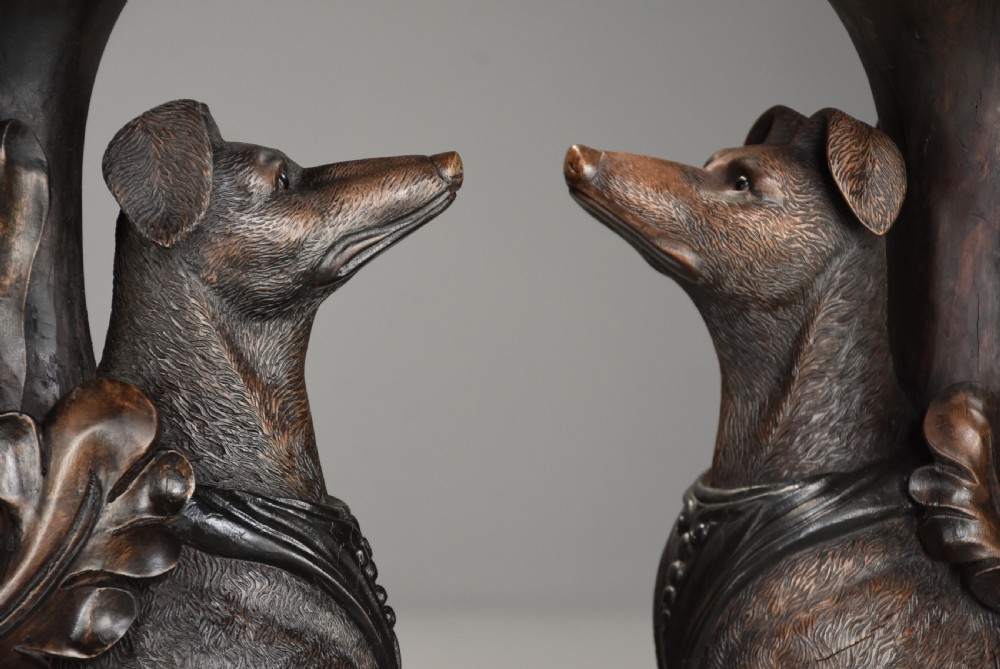 Pair of late 19th-century Black Forest demilune side tables featuring carved seated hound pedestals and white marble tops. View XI