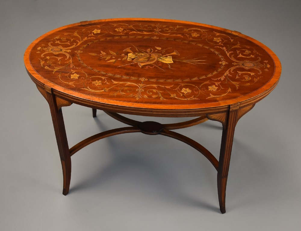 Fine quality Edwardian inlaid mahogany coffee table of oval form View IV